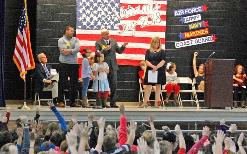 Students at Blackburn Elementary welcome veterans at last year's Veterans Day Ceremony.