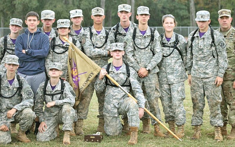 The Lumpkin County JROTC Raider team is pictured after the awards ceremony at the State Competition at Spalding High School. Pictured (from left) standing: Ashlyn Jewell, Mario Mendoza, Chase Cootware, Emily Martinez, Tatianna Lovell, Dane Sexton, Bailey Amey, Cody Gaddis, Madison Rodgers, Reece Butler and coach Jeff Moran. (Kneeling) Brigham Talton, Melia Matkovic and Levi Bennett.