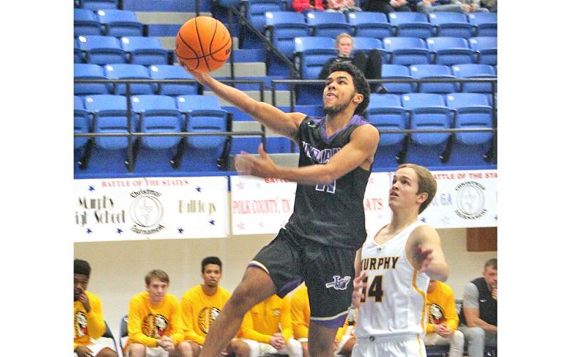 Pat Jackson lays up two of his 21 points in Lumpkin's first round win over Murphy, N.C. at the Battle of the States tournament.