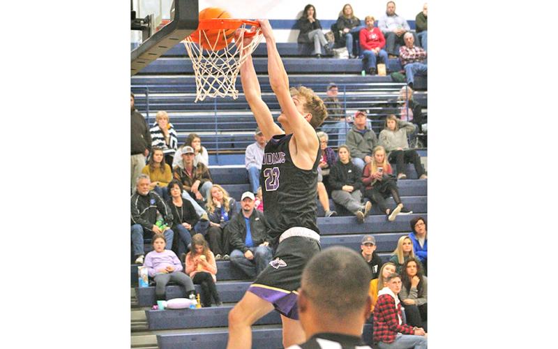 Peyton Polk throws down a monster dunk late in the fourth quarter versus Banks County during Lumpkin's 85-67 victory over the Leopards.