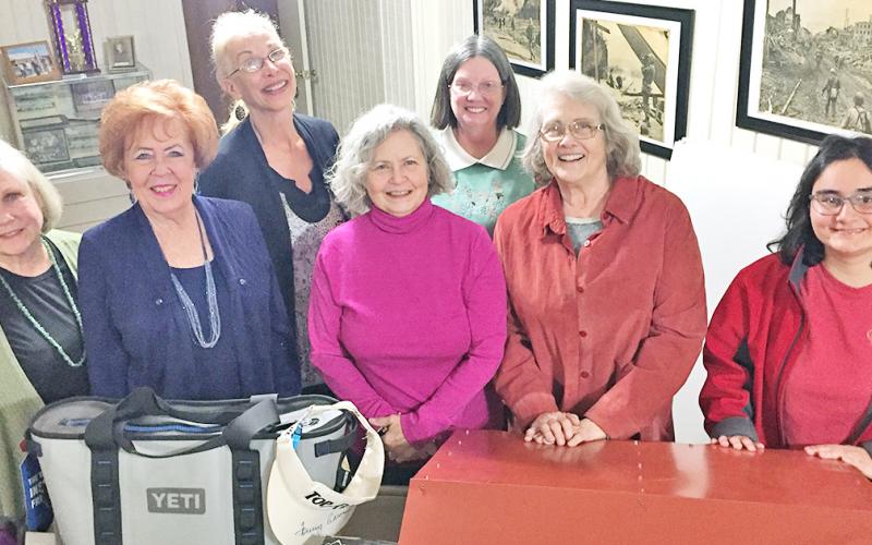 Among the events at the American Legion Post 239 Bazaar Saturday is a rummage sale, silent auction and dinner, all to support Side By Side. Legion Auxillary members (from left) Liz Neitzke, Amy a Stetson, Marilyn Kirkover, Mary Vindish, Nancy Southerland, Barbara and Venessa Bosanko have been gathering and preparing items for weeks. The all day Bazaar takes place at the Legion Hall off Morrison Moore Parkway.
