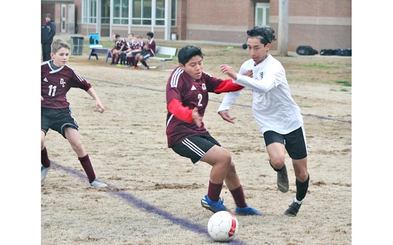 LCMS striker Nicholas Esqueda gets around a Dawson County defender to get inside the box in Lumpkin’s 2020 season opener last week. Esqueda scored three second half goals to help lead the Indians to a 4-0 victory.