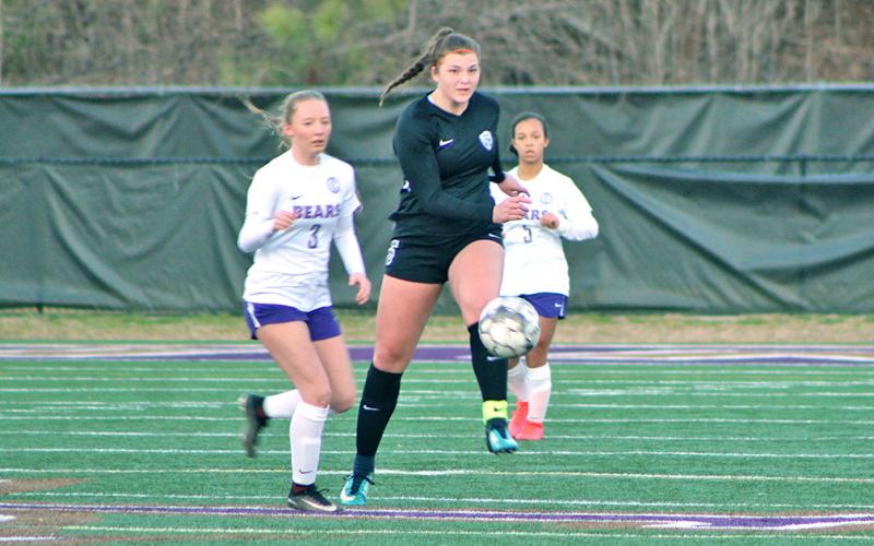 Lumpkin midfielder Reagan Spivey clears a ball during the high school team’s win over Cherokee Bluff. Spivey scored one of the six goals for the Lady Indians in the victory.