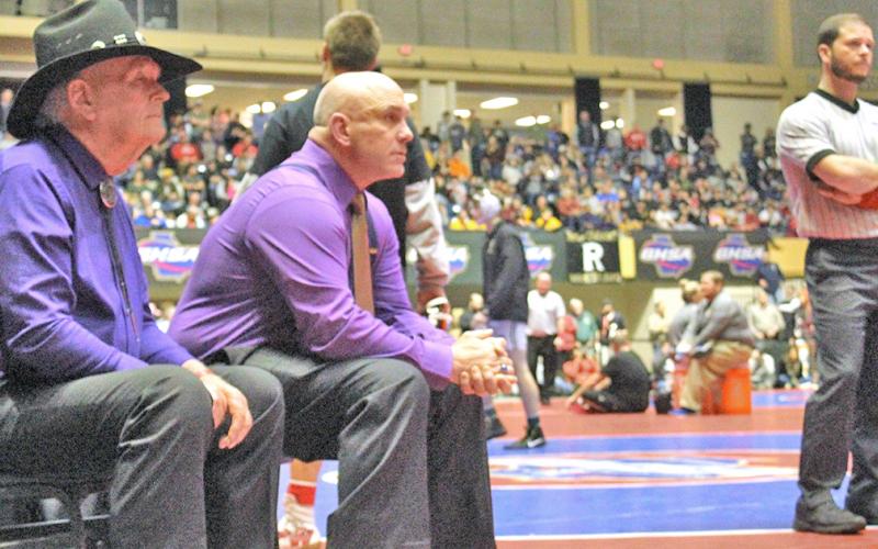 LCHS head wrestling coach Sean Hage (pictured here with LCHS assistant coach Ed Wright on the left) believes that the rules changes the NFHS made recently were a step in the right direction.