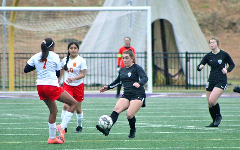 Katy Carroll boots the ball forward to her strikers during a match this past season. Carroll and the other 11 Lady Indian senior players were all selected for the Region 7-AAA All-Region team recently.