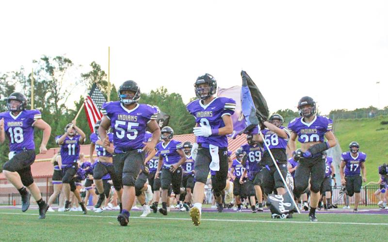 The Lumpkin County varsity football team takes the field for its first game of the season at home against the Franklin County Lions.