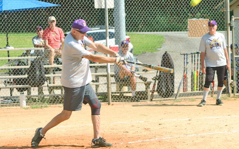 Dahlonega Gold player Jeff “Make My Day” Maynard smacks a double during the Gold’s league matchup against the LC Miners.