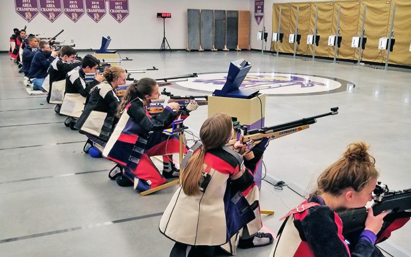 Members of the Lumpkin rifle team take to the Hunting Grounds rifle range at LCHS during the team’s season opening victory over the Gainesville Red Elephants last week.