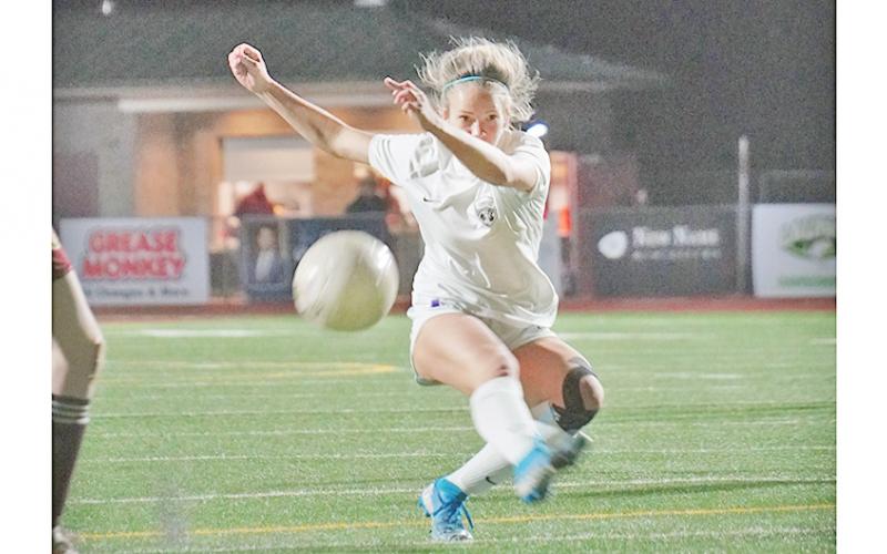 Bri James takes a shot from distance in an attempt to add to Lumpkin’s lead in the second half versus Dawson County on Friday. James eventually connected on a long distance shot, netting the fourth of five goals for the Indians on the night.