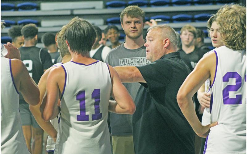 LCHS Boys Basketball head coach Michael Parker talks tactics with his team during a timeout at last week’s Team Camp, hosted by UNG.