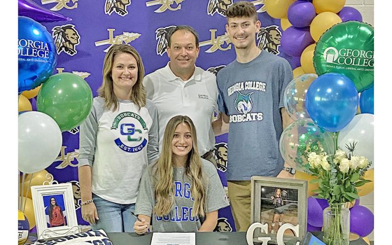 Kiersta Trammell signed to play college volleyball with Georgia College in a signing ceremony with her family before graduating last spring.