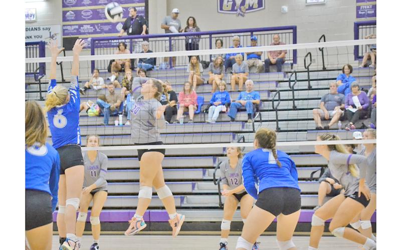 Lumpkin County middle hitter Mary Richardson (20) returns a volley during the Lady Indians match vs. Fannin County last week.