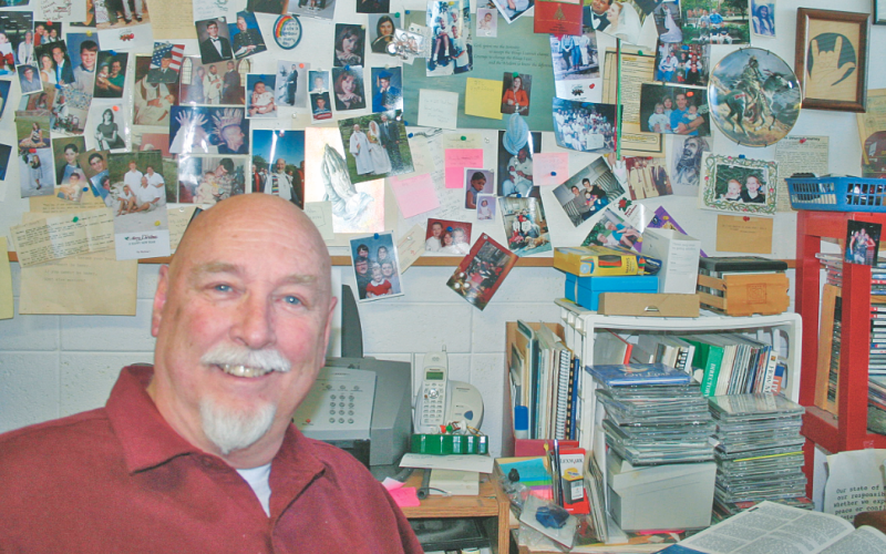 Rev. Frank Colladay's two favorite things were ministering to young people, and performing weddings. This is a 2008 photograph of his office wall, full of images of babies, toddlers, teens and the newly married from 26 years of pastoring Dahlonega Presbyterian Church.