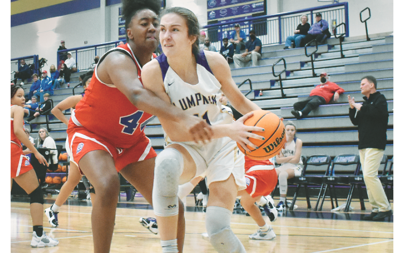 Lumpkin County’s Mary Mullinax drives to the basket during last season’s championship winning run.