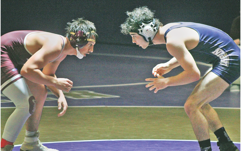 Wrestler TJ Payne takes on his Dawson County opponent during Lumpkin’s home meet last week.