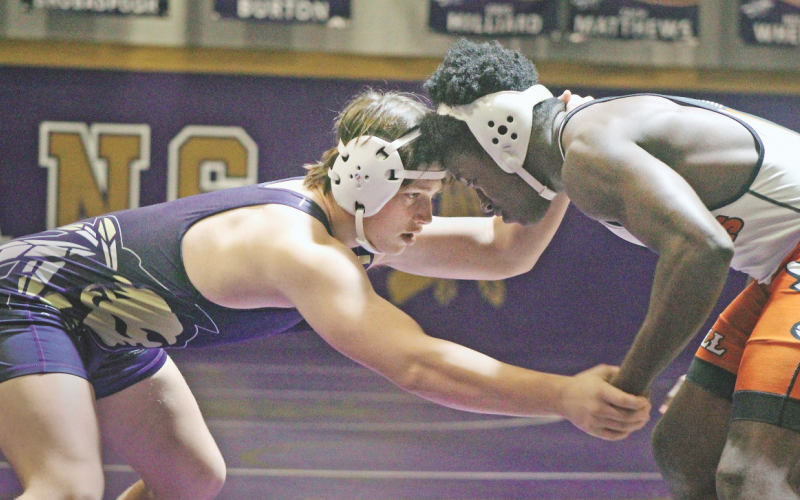 Lumpkin’s Mike Nichols takes on an opponent at the Tribe House.  Nichols was able to pin his talented opponent from White County during the Area Duals last week.