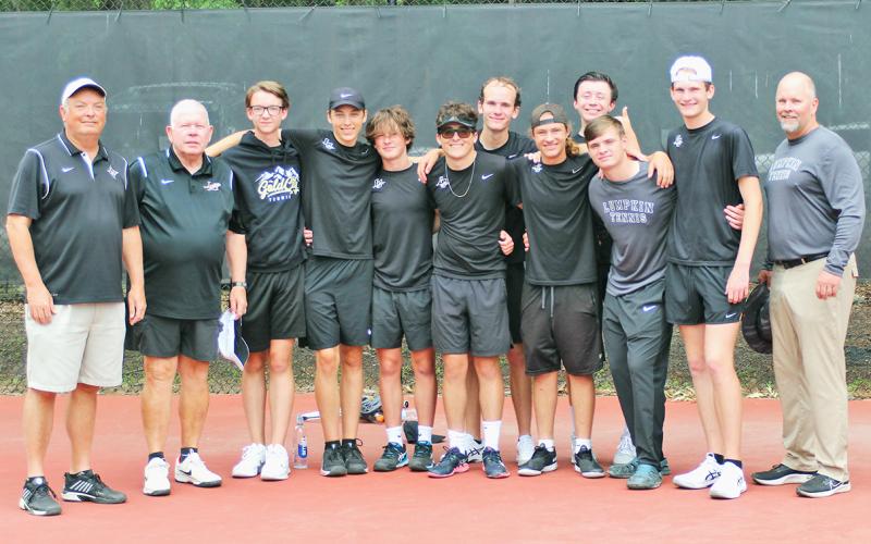 The Lumpkin County boys tennis team pauses for a moment following their game against Savannah Country Day School. (Photo submitted to The Nugget)