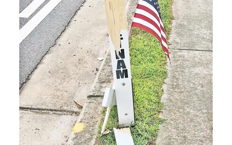 A $2,000 reward is being offered for information leading to the arrest in the vandalism of memorial markers on South Chestatee Street recently.