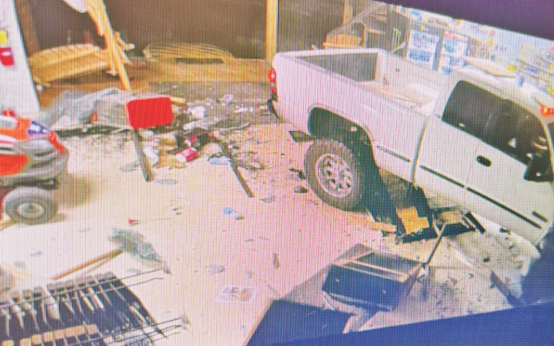 Security cameras captured the scene as of an out-of-control driver plowed through the front doors of Moore's Hardware just before midnight Friday evening.