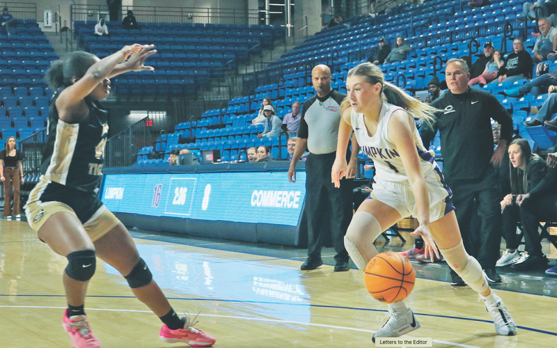 Maddie Lee drives to the hoop in Lumpkin’s game against Commerce at UNG last week.