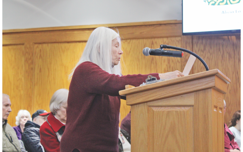 Margo Booth, whose home backs up to the Squaretail property, explains her objections to the proposed development.