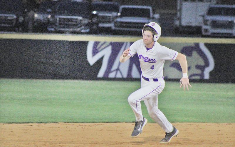 Lumpkin County’s Mason Hester rounds second after a huge hit that he stretched for a triple.