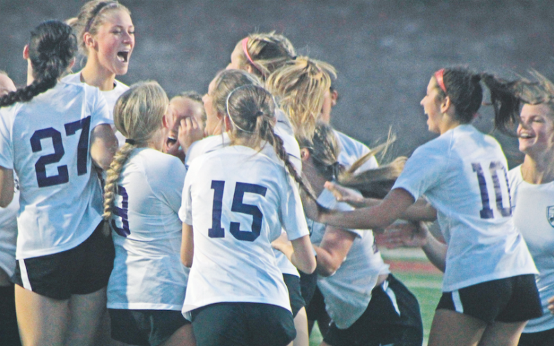 The Lumpkin County High School Indians celebrate their big win after a penalty kick showdown with the Dawson County High School Tigers.