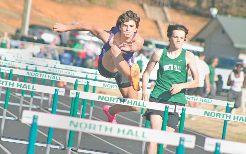 Lumpkin’s MacLane Powell hurdles his way to a first place finish at North Hall.