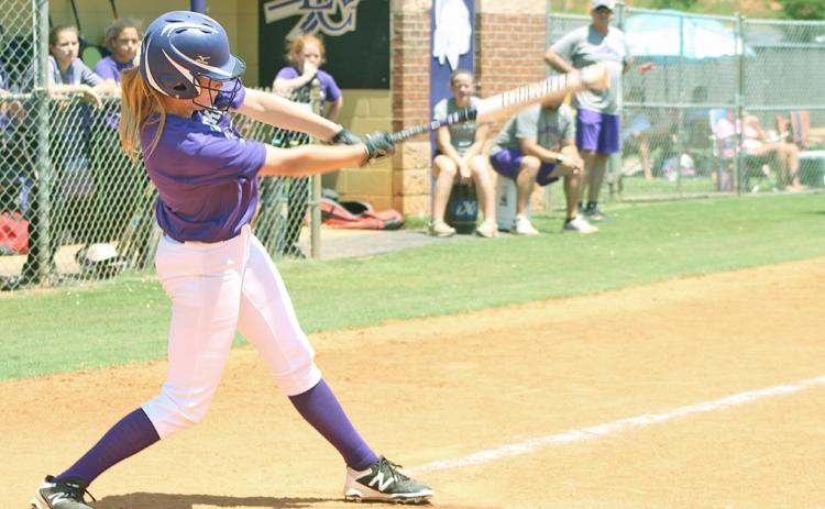 Lady Indians player Haley Voyles knocks in a Lumpkin run with a RBI single. The team will begin its 2019 season versus White County this Friday, August 2.