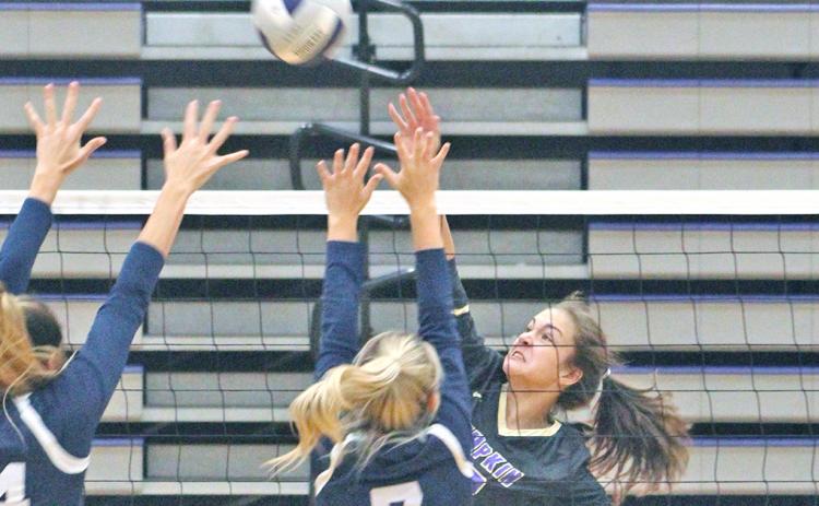 Lady Indians freshman Mary Mullinax gets aggressive at the net for a kill versus West Hall at the Longhouse at the LCHS gymnasium last week.