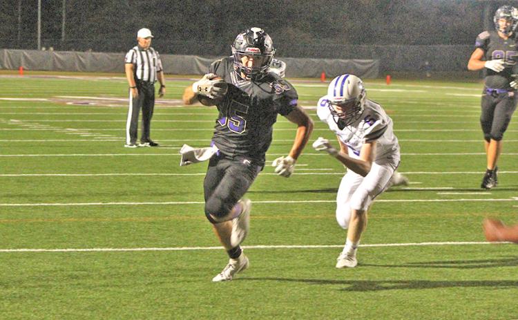 Running back BoJack Dowdy finds his way into the end zone late in the fourth quarter against the Cherokee Bluff Bears.