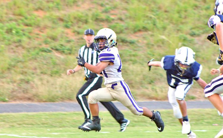 LCMS running back Jonathan Castillo breaks free to score one of his two touchdowns versus White County. 