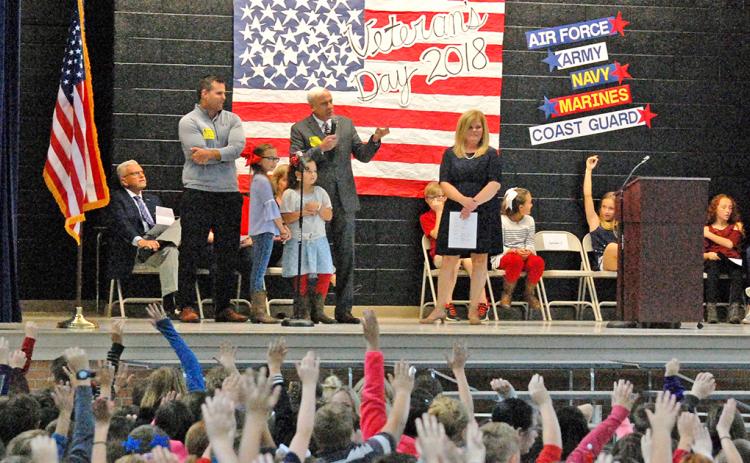 Students at Blackburn Elementary welcome veterans at last year's Veterans Day Ceremony.
