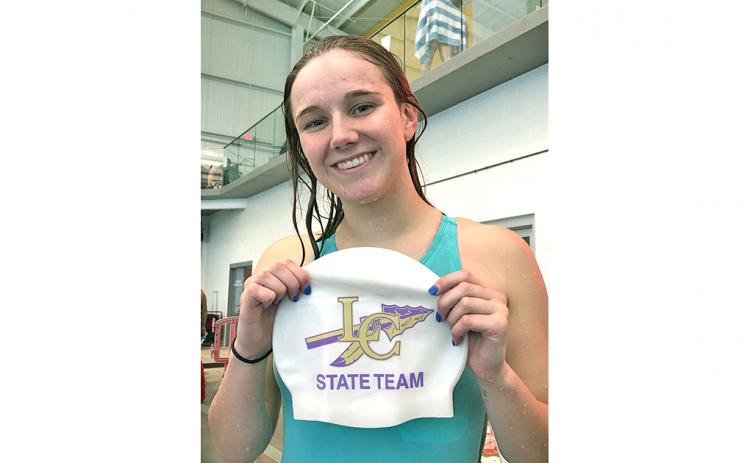 Lady Indians swimmer Faith Schofield celebrates qualifying for the State Swim Meet in the girls 100 yard freestyle during the LCHS swim team’s first meet of the 2019-2020 season.