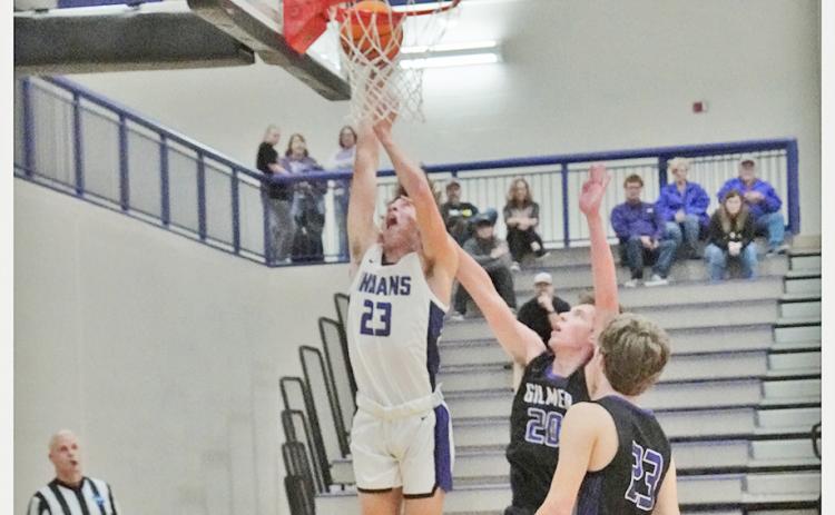 Preston Cox puts up a tough layup in the post versus Gilmer County on Tuesday, Dec. 14. Despite facing a talented and experienced team with tons of height and skill in the post, the Indians’ big man held his own, scoring 11 points and five rebounds in the game.