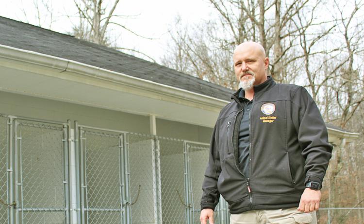 In this photo from January 2020, Lumpkin County Animal Shelter manager Wayne Marshall shows some of the existing dog kennels at the current facility.