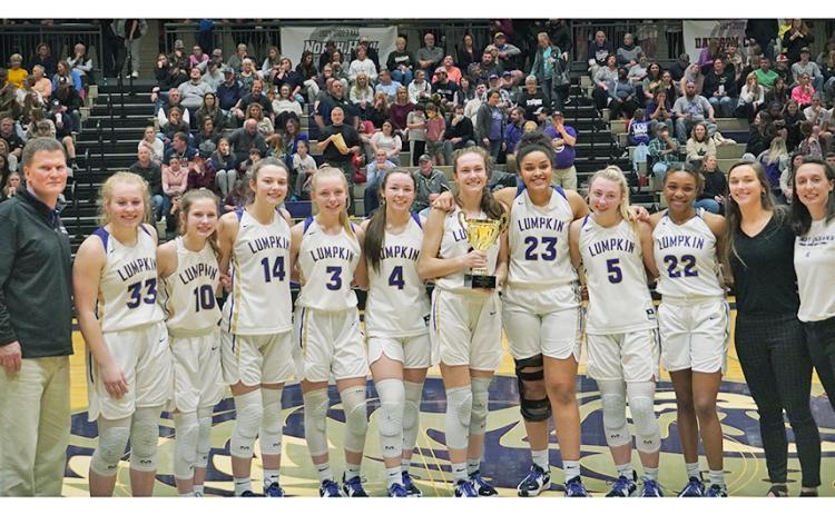The Lumpkin County High School Girls Basketball team win the Region Championship trophy for the second-straight year.