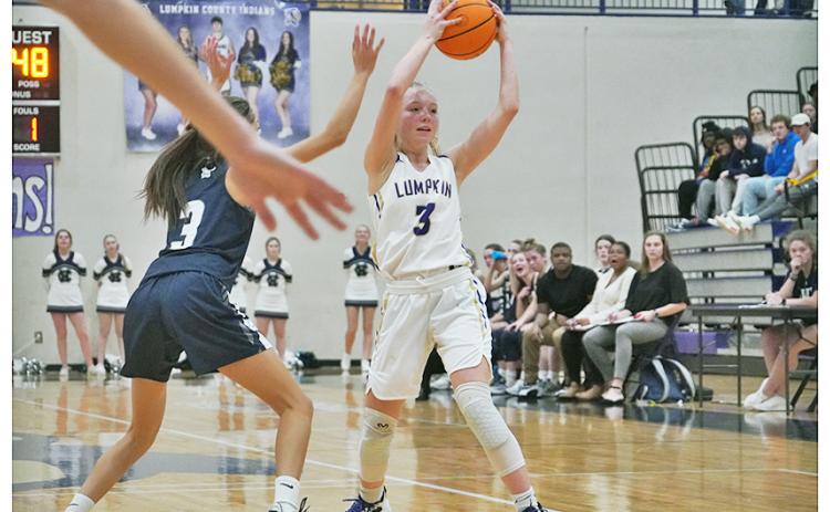 Ciera Brooks looks to feed the ball to an open teammate during Lumpkin’s win over White County.