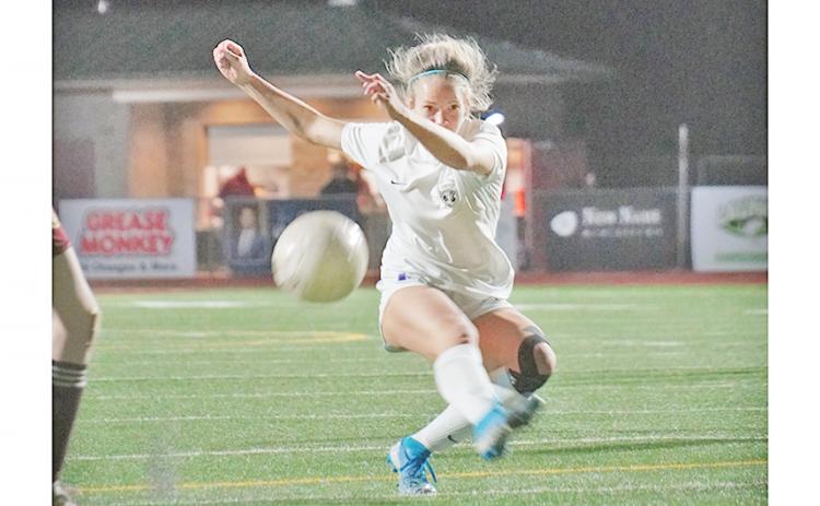 Bri James takes a shot from distance in an attempt to add to Lumpkin’s lead in the second half versus Dawson County on Friday. James eventually connected on a long distance shot, netting the fourth of five goals for the Indians on the night.