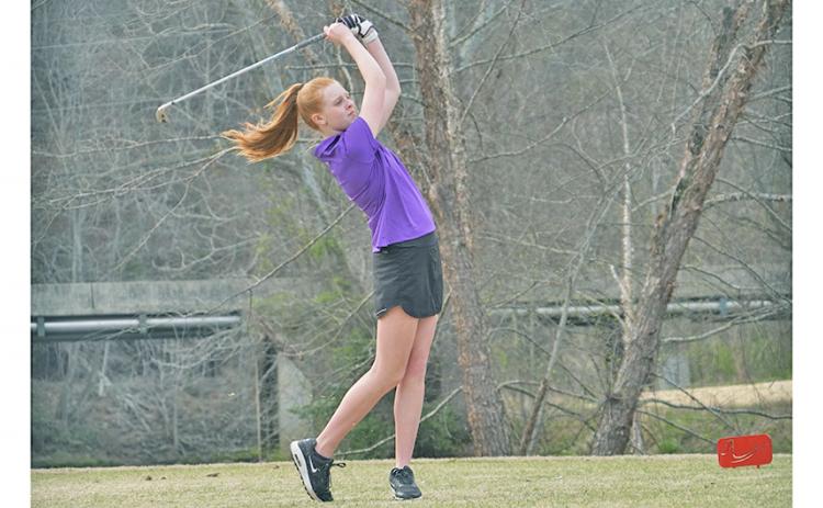 Sophomore Harper Hubbard sends a drive off the tee during Tuesday’s match versus Fannin County. Hubbard shot the low score of the round for Lumpkin on the girls side with a 51. 