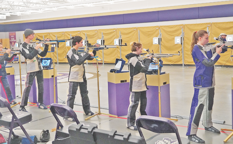 Lumpkin’s five eligible to score shooters (from left) Rebecca Chester, Jake Gary, Joshua Molina, Liv Lusky and Maddy Moyer each take on the standing position, known to be the hardest of the three shooting positions. Head coach Ruthanne Conner said she felt this position is where her team separated itself from the opponents in its semifinal victory to send the team to the state finals.