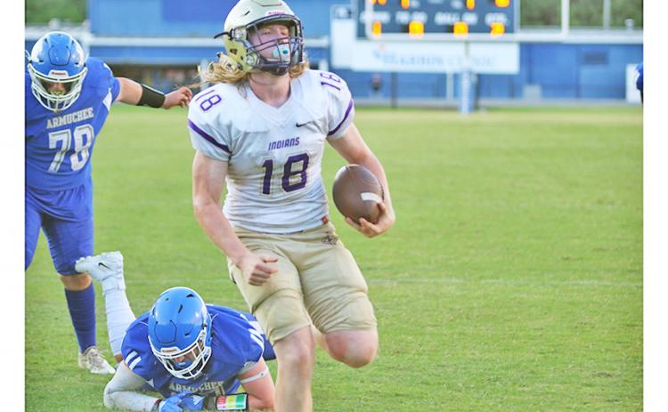 Rising senior quarterback Cooper Scott leaves a wake of would-be tacklers in the dirt before stepping into the end zone for the touchdown during Friday’s Spring Scrimmage 48-0 win over Armuchee High School. Scott threw for a touchdown and ran for two more in the game.