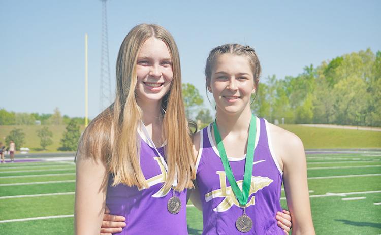 Madison (left) and Riley Myers are making history as the siblings both placed at the Region Championships in the same event and now look to do the same at Sectionals en route to the State Meet.