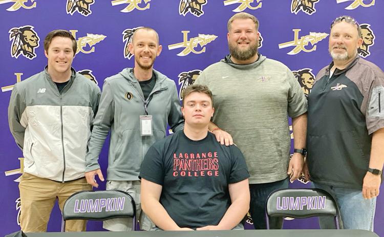Graduating senior Cameron Simpson signed to play college football at Lagrange College earlier this year. Pictured with Simpson at the ceremony are coaches (from left): Andrew Hinchliffe, Caleb Sorrells, John Dye and Steve Horton.