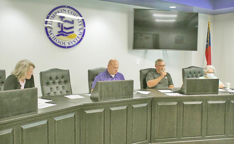 Board of Education members (from left) Lynn Sylvester, Superintendent Rob Brown, Jim McClure and Mera Turner defended the school system's position on the proposed budget at a recent public hearing.