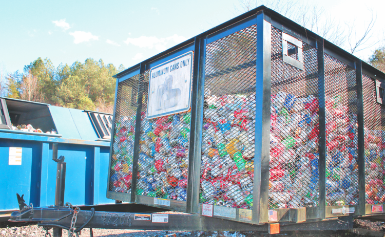 A trailer full of aluminum cans awaits recycling near the county landfill.
