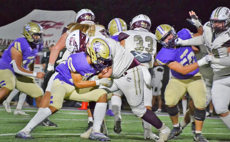 The Lumpkin defense held strong for nearly three quarters, but Dawson eventually overcame the Indians with a strong ground game to pull away for the win.