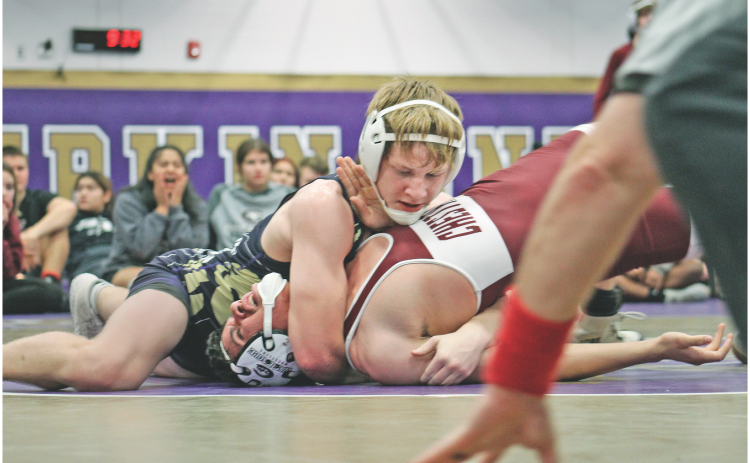 Lumpkin sophomore Nathan Nielsen pins his Chestatee opponent at last week’s home meet. Nielsen also finished in second place at the Indians’ season opening meet. (Photo by Carrie Dawn Roy)