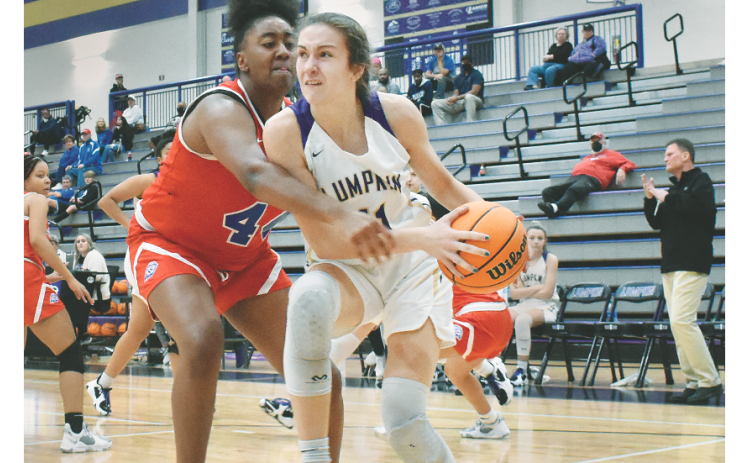 Lumpkin County’s Mary Mullinax drives to the basket during last season’s championship winning run.