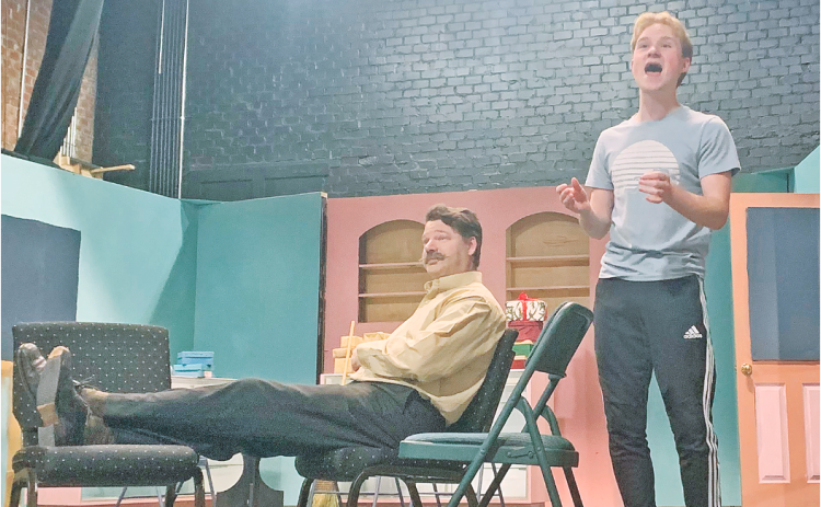 William Mahnken, left, and Spencer Dow rehearse a spirited scene from the play "She Loves Me."